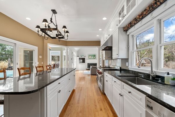Chandelier, Dining room, Interior, Kitchen, Recessed Lighting, Stainless Steel Appliances, Wood Texture Flooring