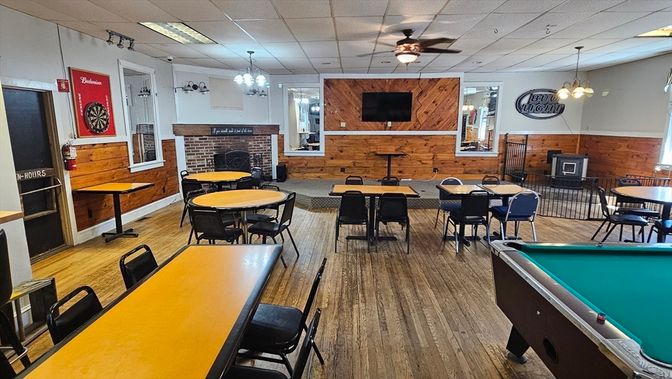 Billiard Table, Dining room, Fireplace, Game Room, Interior, Pendant Lights, Wood Texture Flooring, Wooden Walls