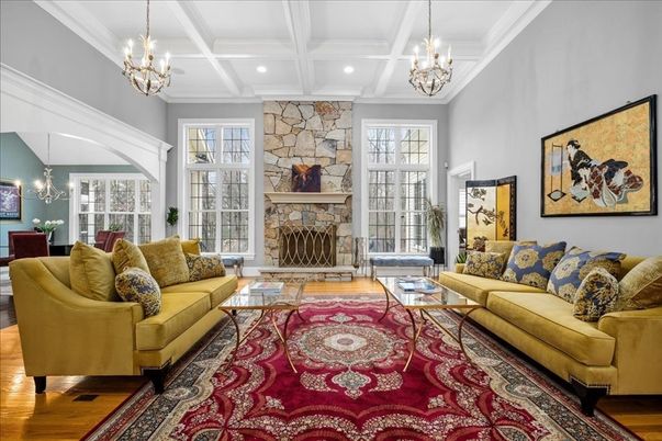 Chandelier, Fireplace, Interior, Living room, Recessed Lighting, Stone Walls, Wood Texture Flooring