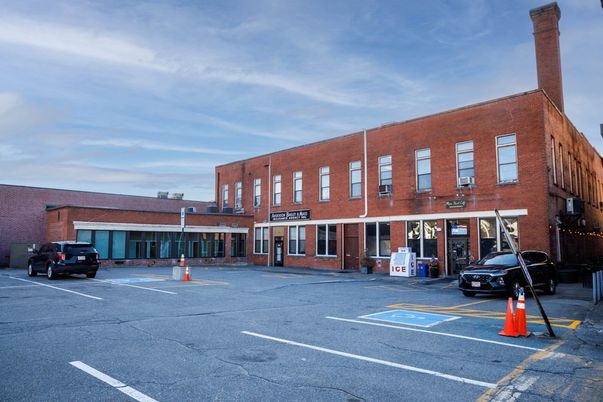 Exterior, Facade, Brick Facade, Condo Building