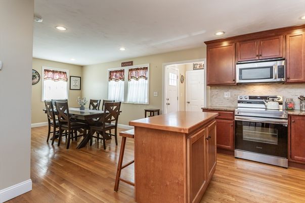 Dining room, Interior, Kitchen, Recessed Lighting, Stainless Steel Appliances, Wood Texture Flooring