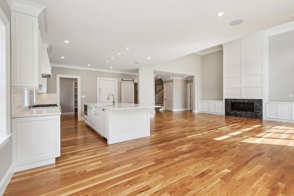 Empty room, Fireplace, Interior, Kitchen, Recessed Lighting, Wood Texture Flooring
