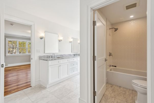 Bathroom, Dual Sink Vanities, Interior, Recessed Lighting, Wood Texture Flooring