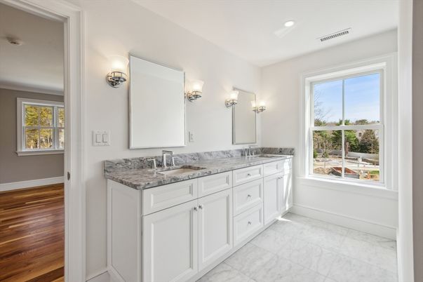 Bathroom, Dual Sink Vanities, Interior, Marble, Recessed Lighting, Wood Texture Flooring