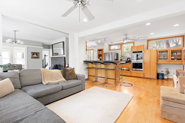 Fireplace, Interior, Kitchen, Living room, Recessed Lighting, Stainless Steel Appliances, Wood Texture Flooring