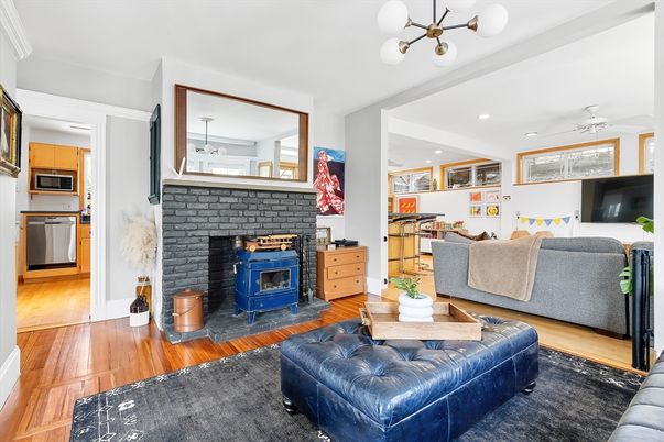 Fireplace, Interior, Kitchen, Living room, Pendant Lights, Recessed Lighting, Stainless Steel Appliances, Wood Texture Flooring