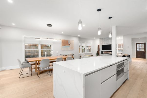 Dining room, Fireplace, Interior, Kitchen, Pendant Lights, Recessed Lighting, Wood Texture Flooring
