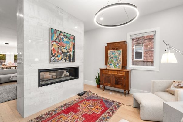 Fireplace, Interior, Marble Walls, Pendant Lights, Recessed Lighting, Wood Texture Flooring