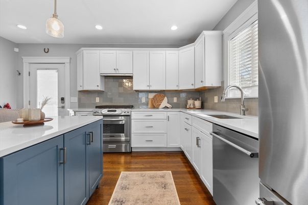 Interior, Kitchen, Pendant Lights, Recessed Lighting, Stainless Steel Appliances, Wood Texture Flooring