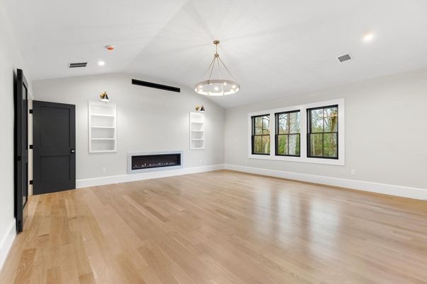 Empty room, Fireplace, Interior, Pendant Lights, Recessed Lighting, Wood Texture Flooring