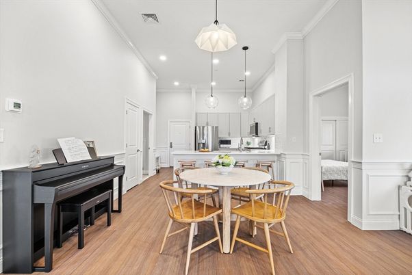 Dining room, Interior, Kitchen, Pendant Lights, Piano, Recessed Lighting, Stainless Steel Appliances, Wood Texture Flooring