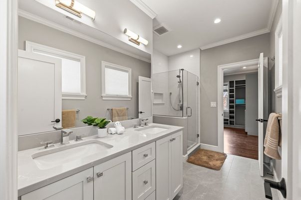 Bathroom, Dual Sink Vanities, Glass Shower, Interior, Recessed Lighting, Walk-in Closets, Wood Texture Flooring