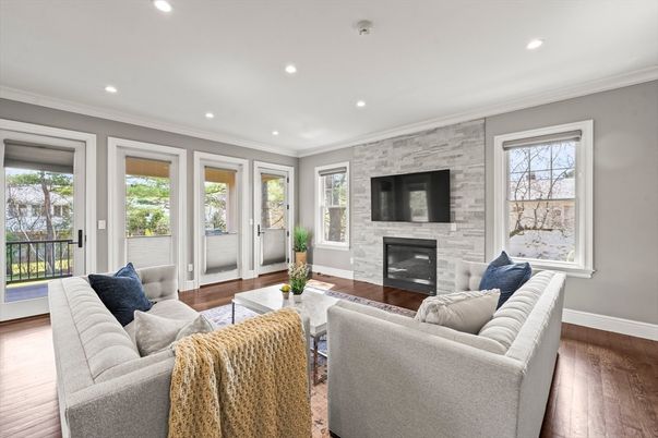 Fireplace, Interior, Living room, Recessed Lighting, Stone Walls, Wood Texture Flooring