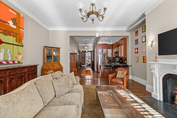 Chandelier, Fireplace, Interior, Kitchen, Living room, Recessed Lighting, Stainless Steel Appliances, Wood Texture Flooring