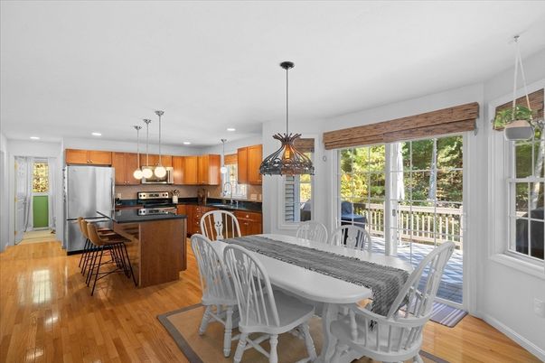 Dining room, Interior, Kitchen, Pendant Lights, Recessed Lighting, Stainless Steel Appliances, Wood Texture Flooring