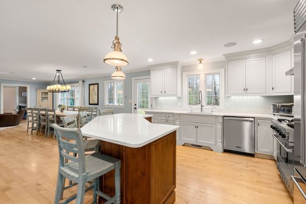Chandelier, Dining room, Interior, Kitchen, Pendant Lights, Recessed Lighting, Stainless Steel Appliances, Wood Texture Flooring