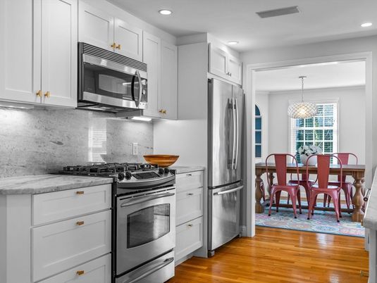 Dining room, Interior, Kitchen, Pendant Lights, Recessed Lighting, Stainless Steel Appliances, Wood Texture Flooring