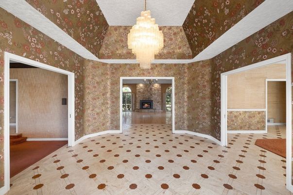 Chandelier, Empty room, Fireplace, Interior