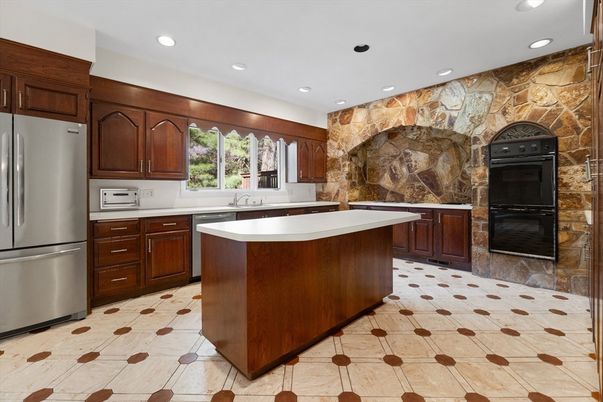 Interior, Kitchen, Recessed Lighting, Stainless Steel Appliances, Stone Walls