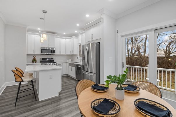 Dining room, Interior, Kitchen, Pendant Lights, Recessed Lighting, Stainless Steel Appliances, Wood Texture Flooring