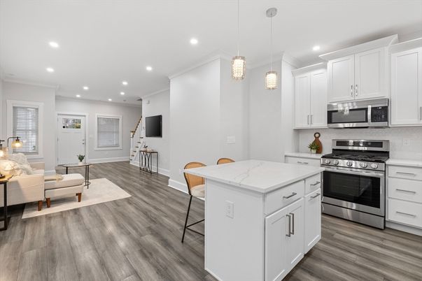 Interior, Kitchen, Pendant Lights, Recessed Lighting, Stainless Steel Appliances, Wood Texture Flooring