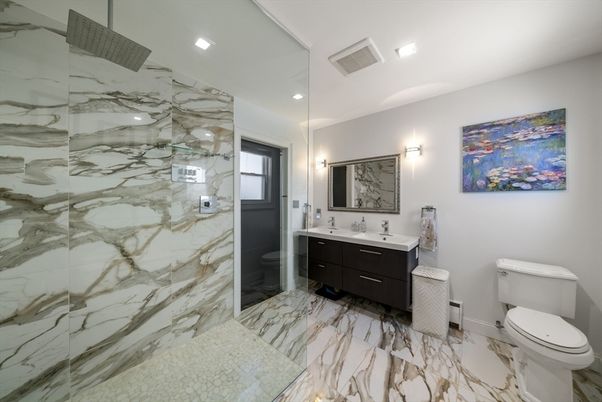 Bathroom, Dual Sink Vanities, Glass Shower, Interior, Marble, Marble Walls, Recessed Lighting
