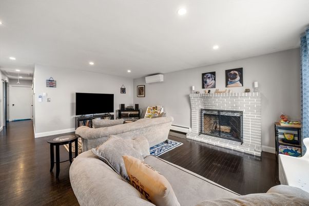 Fireplace, Interior, Living room, Recessed Lighting, Wood Texture Flooring