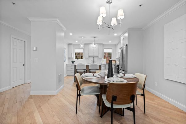 Chandelier, Dining room, Interior, Kitchen, Pendant Lights, Recessed Lighting, Stainless Steel Appliances, Wood Texture Flooring