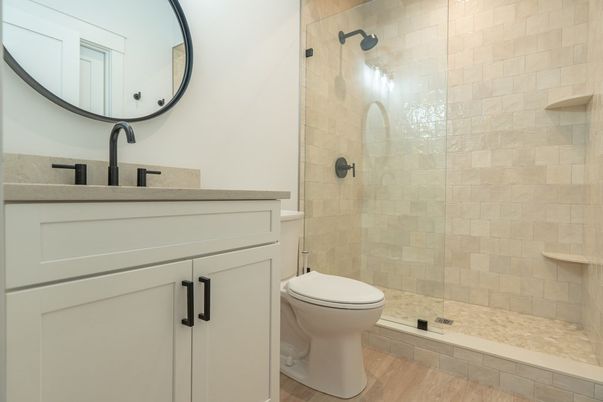 Bathroom, Glass Shower, Interior, Stone Walls, Wood Texture Flooring