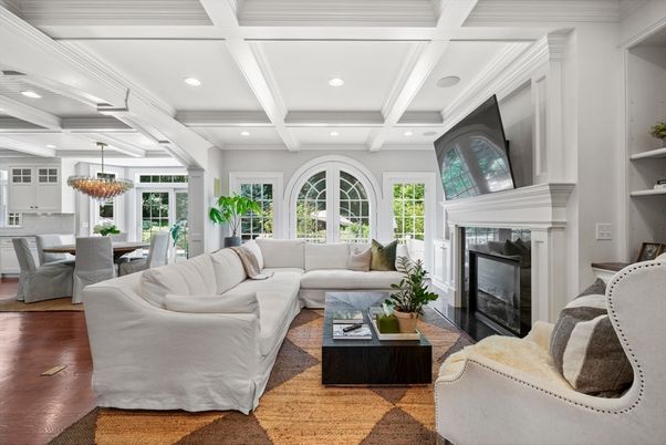 Chandelier, Dining room, Fireplace, Interior, Living room, Pendant Lights, Recessed Lighting, Wood Texture Flooring