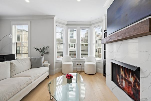 Fireplace, Interior, Living room, Marble Walls, Recessed Lighting, Wood Texture Flooring