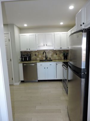 Interior, Kitchen, Recessed Lighting, Stainless Steel Appliances, Wood Texture Flooring
