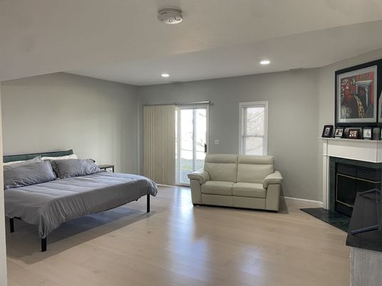 Bedroom, Fireplace, Interior, Recessed Lighting, Wood Texture Flooring