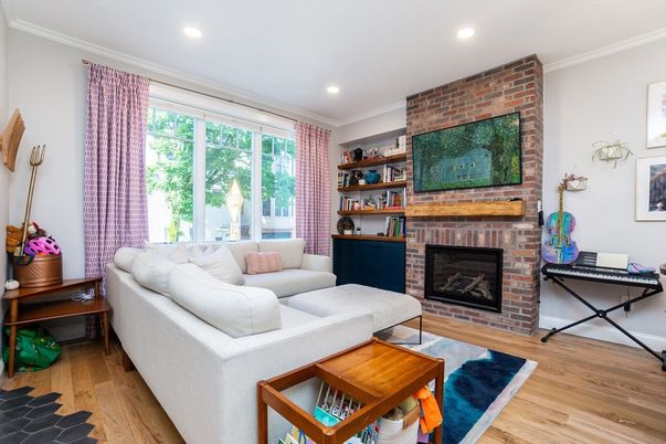 Fireplace, Interior, Living room, Recessed Lighting, Stone Walls, Wood Texture Flooring