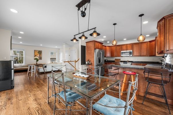 Dining room, Interior, Kitchen, Pendant Lights, Recessed Lighting, Stainless Steel Appliances, Wood Texture Flooring