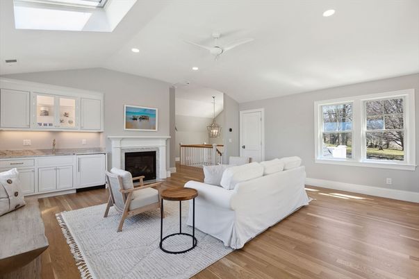 Dining room, Fireplace, Interior, Living room, Pendant Lights, Recessed Lighting, Wood Texture Flooring