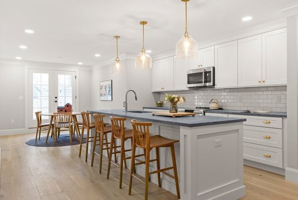 Dining room, Interior, Kitchen, Pendant Lights, Recessed Lighting, Stainless Steel Appliances, Wood Texture Flooring