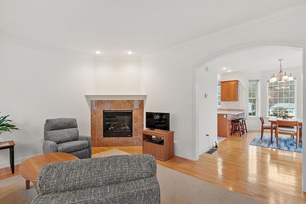 Chandelier, Dining room, Fireplace, Interior, Living room, Recessed Lighting, Wood Texture Flooring