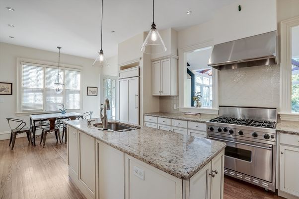 Dining room, Interior, Kitchen, Pendant Lights, Recessed Lighting, Stainless Steel Appliances, Wood Texture Flooring