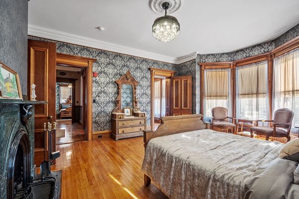 Bedroom, Chandelier, Fireplace, Interior, Wood Texture Flooring