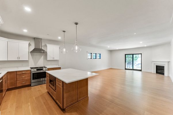 Fireplace, Interior, Kitchen, Pendant Lights, Recessed Lighting, Stainless Steel Appliances, Wood Texture Flooring