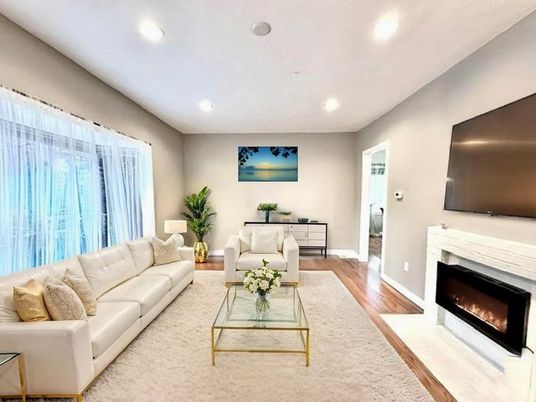 Fireplace, Interior, Living room, Recessed Lighting, Wood Texture Flooring