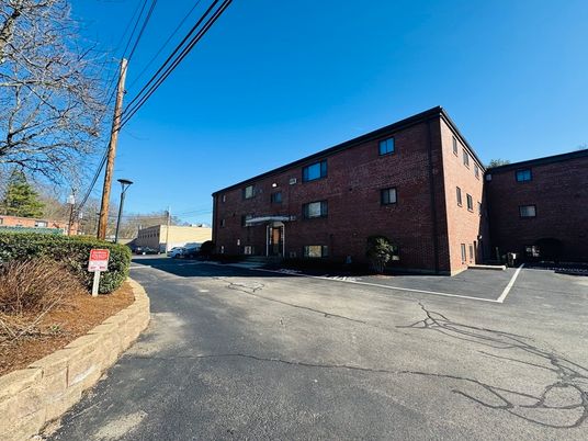 Exterior, Facade, Brick Facade, Condo Building