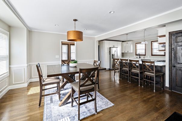 Dining room, Interior, Kitchen, Pendant Lights, Recessed Lighting, Stainless Steel Appliances, Wood Texture Flooring