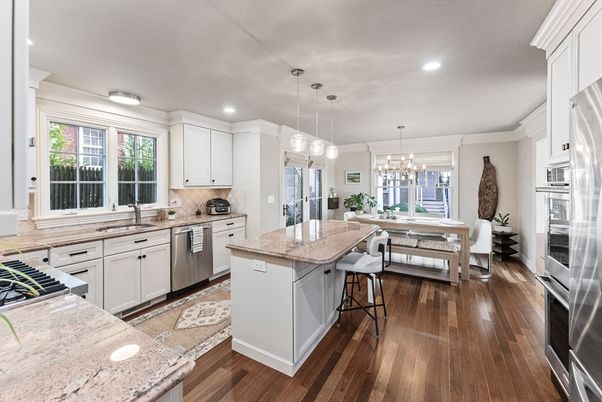 Dining room, Interior, Kitchen, Pendant Lights, Recessed Lighting, Stainless Steel Appliances, Wood Texture Flooring