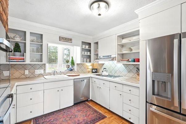 Interior, Kitchen, Stainless Steel Appliances, Tile Countertops, Wood Texture Flooring