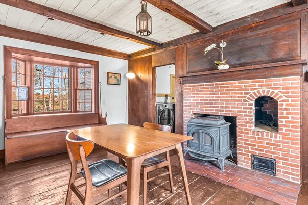 Dining room, Fireplace, Interior, Pendant Lights, Stone Walls, Wooden Beams, Wood Texture Flooring