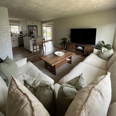 Dining room, Interior, Kitchen, Living room, Recessed Lighting, Stone Walls, Wood Texture Flooring