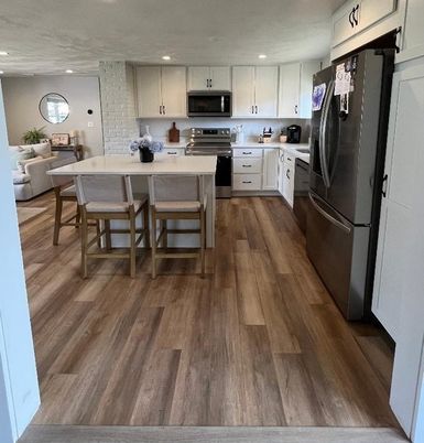 Dining room, Interior, Kitchen, Recessed Lighting, Stainless Steel Appliances, Wood Texture Flooring