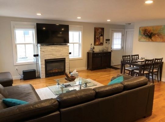 Dining room, Fireplace, Interior, Living room, Recessed Lighting, Wood Texture Flooring